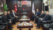 Haliliye Kaymakamı Erkan Savar’dan Başkan İsmail Karacabey’e Ziyaret
